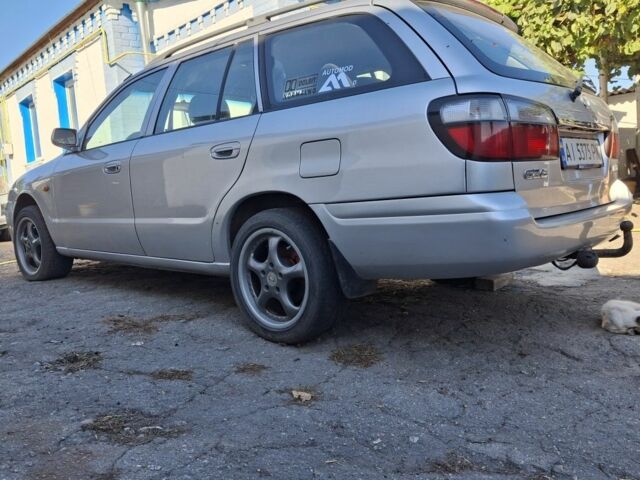 Серый Мазда 6, объемом двигателя 2 л и пробегом 260 тыс. км за 3000 $, фото 2 на Automoto.ua