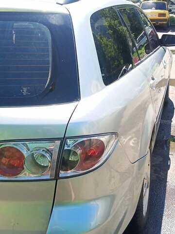 Серый Мазда 6, объемом двигателя 2 л и пробегом 246 тыс. км за 4000 $, фото 3 на Automoto.ua