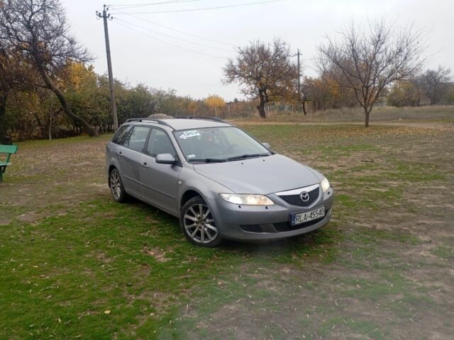Серый Мазда 6, объемом двигателя 2 л и пробегом 296 тыс. км за 3300 $, фото 2 на Automoto.ua