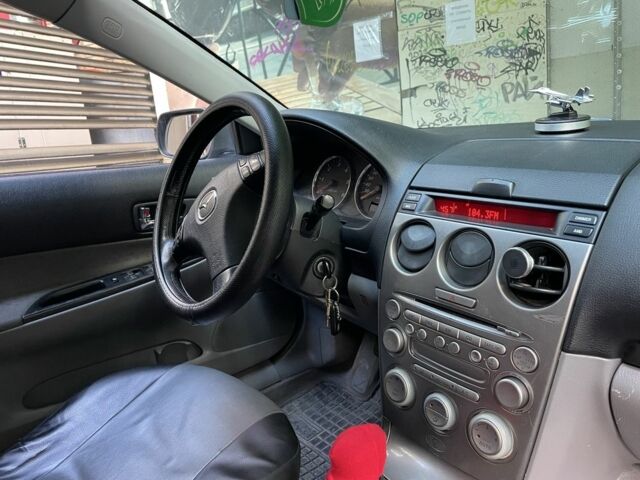 Серый Мазда 6, объемом двигателя 2 л и пробегом 320 тыс. км за 3600 $, фото 4 на Automoto.ua