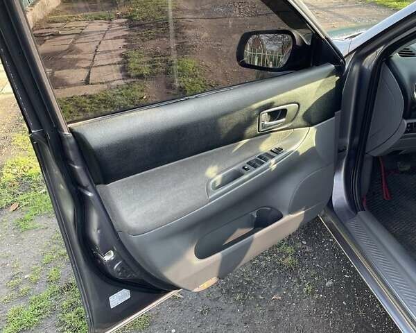 Серый Мазда 6, объемом двигателя 2 л и пробегом 218 тыс. км за 3550 $, фото 12 на Automoto.ua