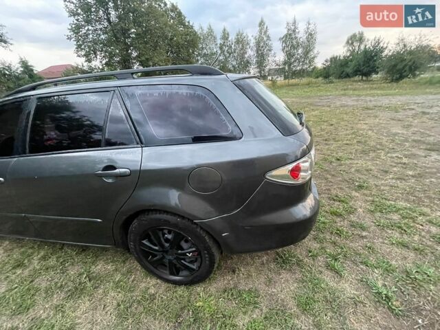 Серый Мазда 6, объемом двигателя 2 л и пробегом 292 тыс. км за 3200 $, фото 12 на Automoto.ua