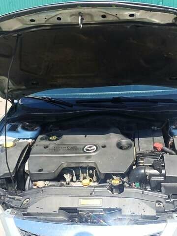 Серый Мазда 6, объемом двигателя 2 л и пробегом 246 тыс. км за 4000 $, фото 6 на Automoto.ua