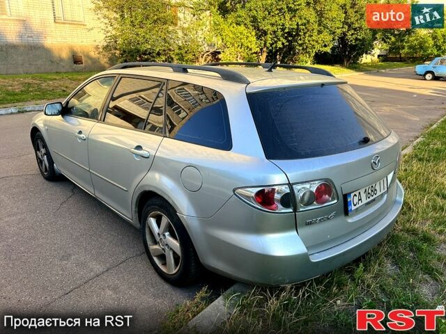 Серый Мазда 6, объемом двигателя 2 л и пробегом 320 тыс. км за 2500 $, фото 2 на Automoto.ua