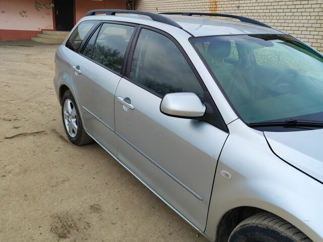 Серый Мазда 6, объемом двигателя 2 л и пробегом 328 тыс. км за 3000 $, фото 2 на Automoto.ua