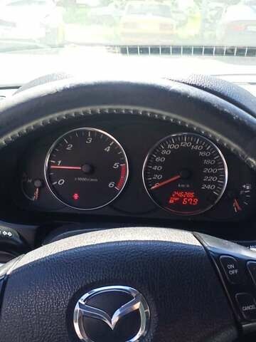 Серый Мазда 6, объемом двигателя 2 л и пробегом 246 тыс. км за 4000 $, фото 9 на Automoto.ua