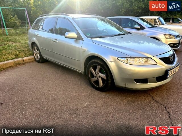 Серый Мазда 6, объемом двигателя 2 л и пробегом 320 тыс. км за 2500 $, фото 1 на Automoto.ua
