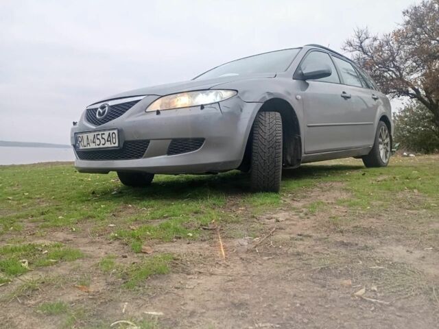 Серый Мазда 6, объемом двигателя 2 л и пробегом 296 тыс. км за 3300 $, фото 1 на Automoto.ua