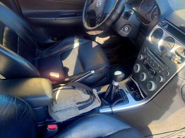 Серый Мазда 6, объемом двигателя 2.3 л и пробегом 305 тыс. км за 3500 $, фото 3 на Automoto.ua