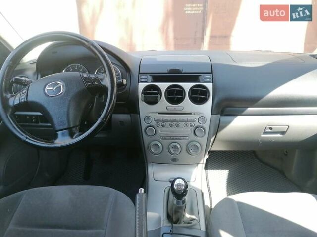 Серый Мазда 6, объемом двигателя 1.8 л и пробегом 314 тыс. км за 5550 $, фото 7 на Automoto.ua