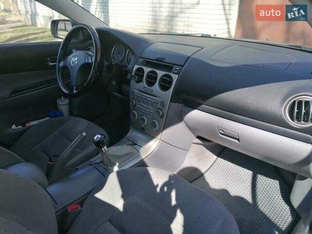 Серый Мазда 6, объемом двигателя 1.8 л и пробегом 314 тыс. км за 5550 $, фото 8 на Automoto.ua