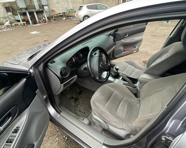 Сірий Мазда 6, об'ємом двигуна 2 л та пробігом 267 тис. км за 3700 $, фото 3 на Automoto.ua