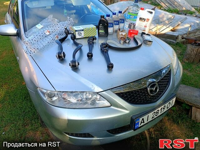 Серый Мазда 6, объемом двигателя 2 л и пробегом 355 тыс. км за 4700 $, фото 9 на Automoto.ua