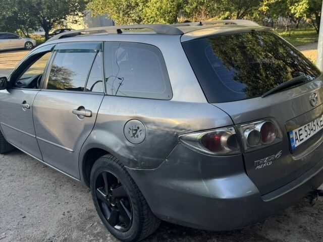 Серый Мазда 6, объемом двигателя 2 л и пробегом 389 тыс. км за 3310 $, фото 3 на Automoto.ua