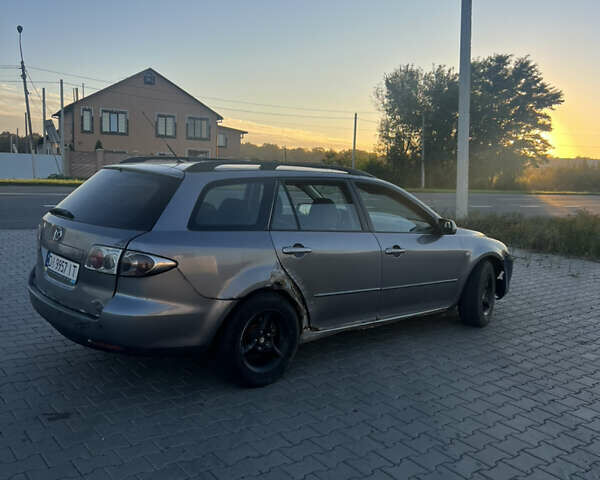 Сірий Мазда 6, об'ємом двигуна 2 л та пробігом 293 тис. км за 1600 $, фото 5 на Automoto.ua