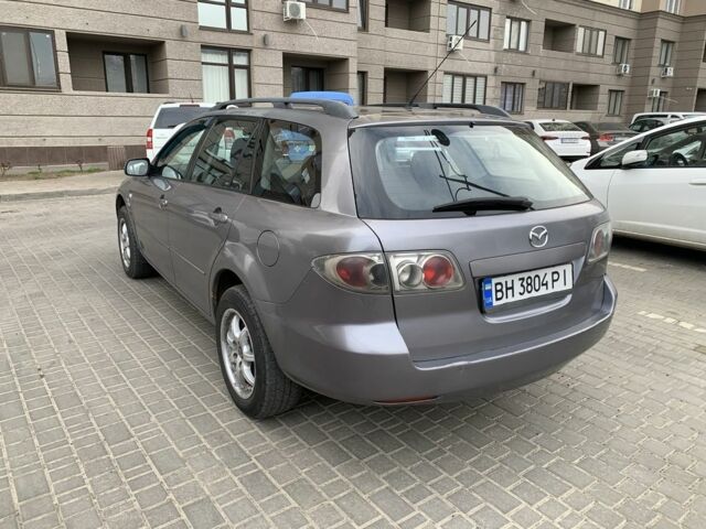 Серый Мазда 6, объемом двигателя 2 л и пробегом 303 тыс. км за 4000 $, фото 4 на Automoto.ua