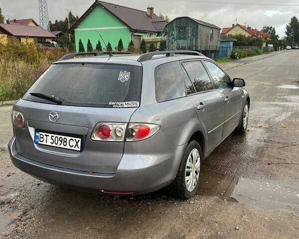 Серый Мазда 6, объемом двигателя 2 л и пробегом 417 тыс. км за 2800 $, фото 2 на Automoto.ua