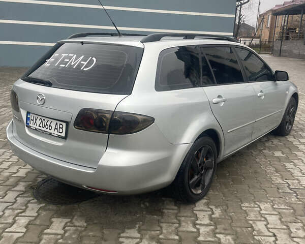 Серый Мазда 6, объемом двигателя 2 л и пробегом 350 тыс. км за 3800 $, фото 2 на Automoto.ua