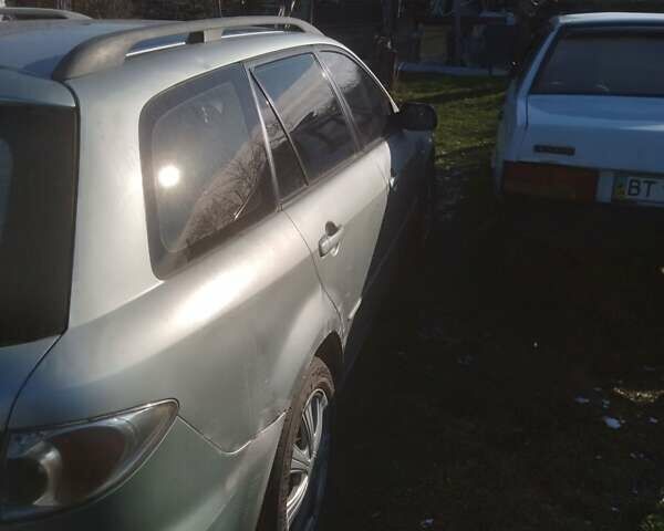 Серый Мазда 6, объемом двигателя 2 л и пробегом 300 тыс. км за 2550 $, фото 6 на Automoto.ua