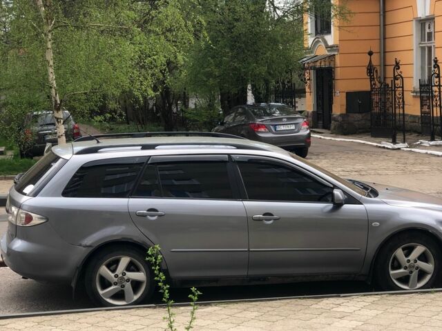 Серый Мазда 6, объемом двигателя 2 л и пробегом 306 тыс. км за 3200 $, фото 1 на Automoto.ua