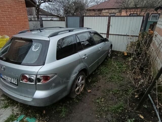 Серый Мазда 6, объемом двигателя 2 л и пробегом 320 тыс. км за 1691 $, фото 1 на Automoto.ua