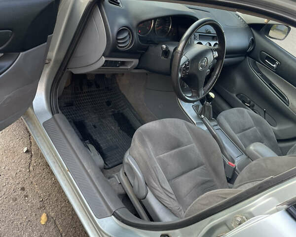 Серый Мазда 6, объемом двигателя 2 л и пробегом 399 тыс. км за 3100 $, фото 7 на Automoto.ua