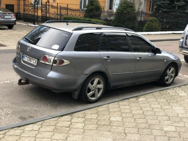 Серый Мазда 6, объемом двигателя 2 л и пробегом 306 тыс. км за 3200 $, фото 2 на Automoto.ua