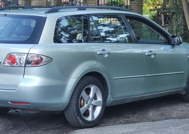 Сірий Мазда 6, об'ємом двигуна 2 л та пробігом 210 тис. км за 2450 $, фото 2 на Automoto.ua