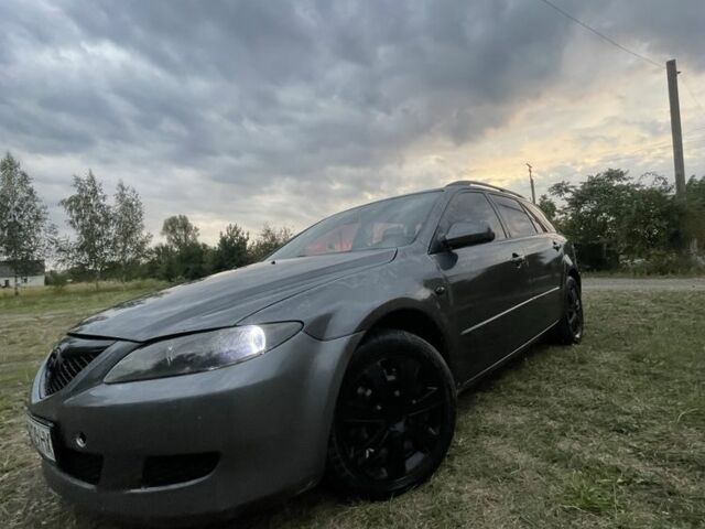 Серый Мазда 6, объемом двигателя 2 л и пробегом 292 тыс. км за 3211 $, фото 4 на Automoto.ua