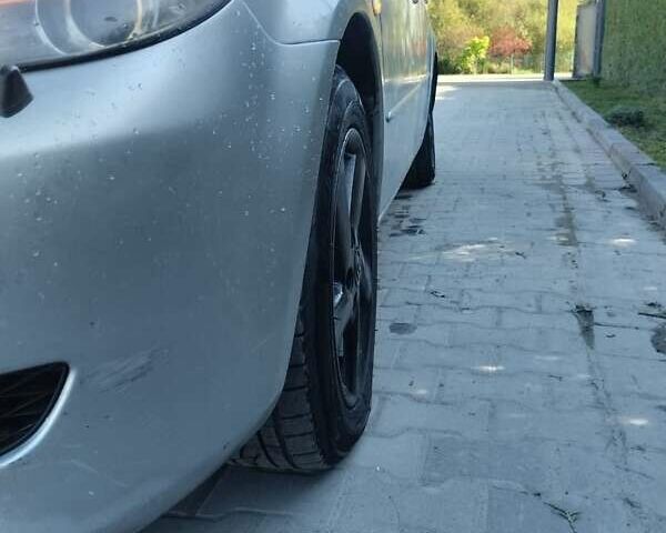 Серый Мазда 6, объемом двигателя 2 л и пробегом 300 тыс. км за 1750 $, фото 1 на Automoto.ua