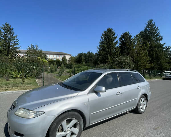 Сірий Мазда 6, об'ємом двигуна 2 л та пробігом 250 тис. км за 2399 $, фото 1 на Automoto.ua
