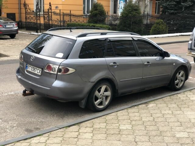 Серый Мазда 6, объемом двигателя 2 л и пробегом 306 тыс. км за 3200 $, фото 3 на Automoto.ua