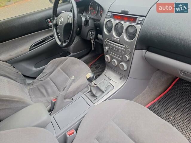 Серый Мазда 6, объемом двигателя 2 л и пробегом 441 тыс. км за 2900 $, фото 26 на Automoto.ua