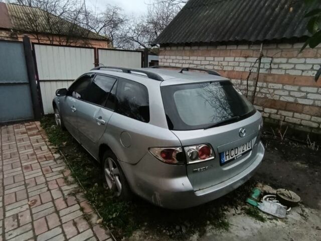Серый Мазда 6, объемом двигателя 2 л и пробегом 320 тыс. км за 1691 $, фото 2 на Automoto.ua