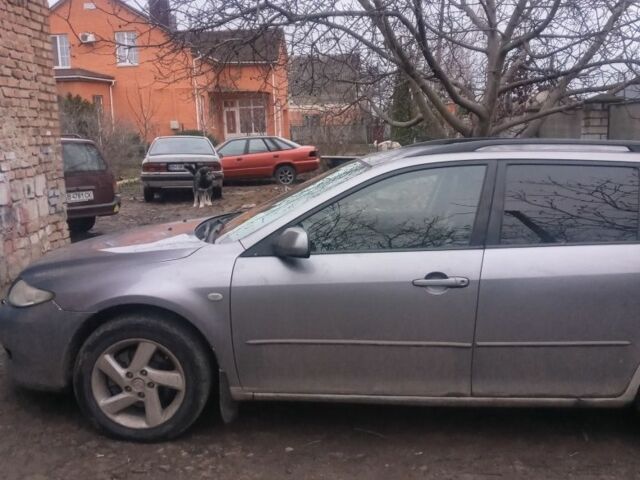 Серый Мазда 6, объемом двигателя 2 л и пробегом 300 тыс. км за 3000 $, фото 2 на Automoto.ua