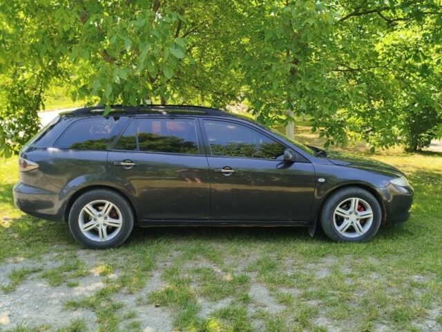 Сірий Мазда 6, об'ємом двигуна 2 л та пробігом 310 тис. км за 4300 $, фото 4 на Automoto.ua