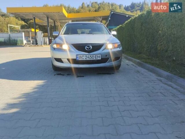 Серый Мазда 6, объемом двигателя 2 л и пробегом 300 тыс. км за 1750 $, фото 2 на Automoto.ua