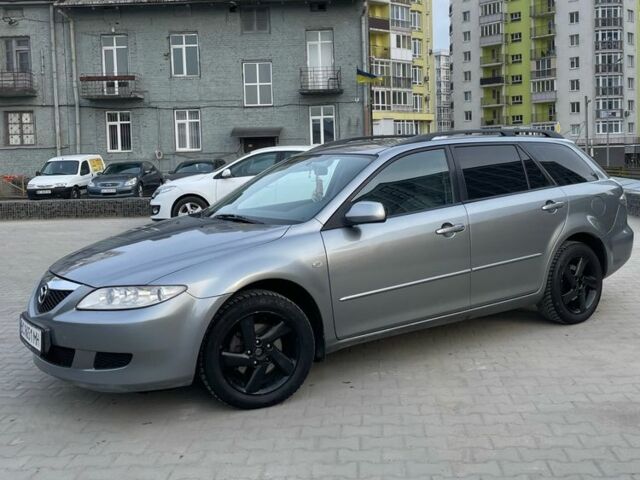 Серый Мазда 6, объемом двигателя 2 л и пробегом 418 тыс. км за 4500 $, фото 1 на Automoto.ua