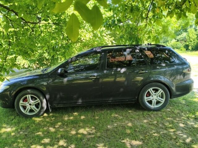 Сірий Мазда 6, об'ємом двигуна 2 л та пробігом 310 тис. км за 4300 $, фото 2 на Automoto.ua
