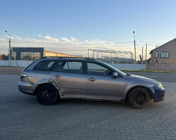 Сірий Мазда 6, об'ємом двигуна 2 л та пробігом 293 тис. км за 1600 $, фото 4 на Automoto.ua