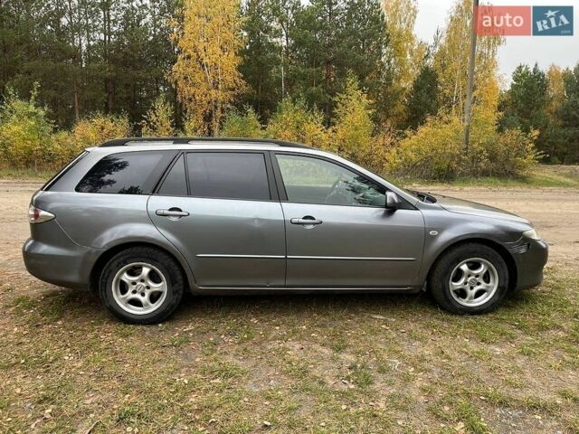 Серый Мазда 6, объемом двигателя 2 л и пробегом 350 тыс. км за 3003 $, фото 2 на Automoto.ua