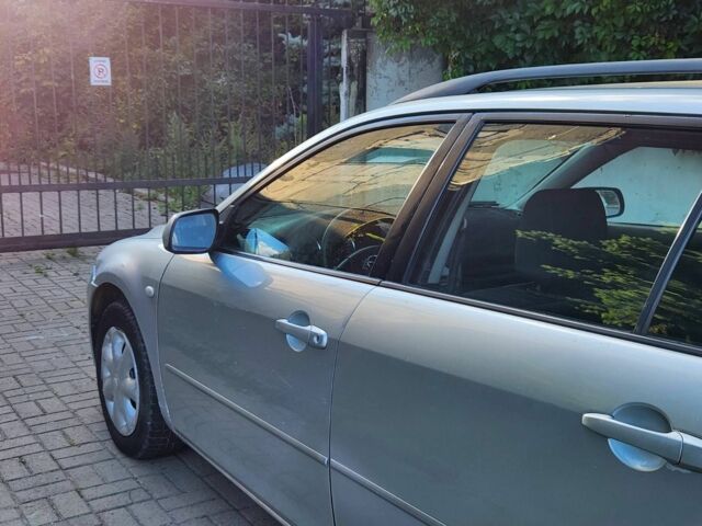 Сірий Мазда 6, об'ємом двигуна 2 л та пробігом 411 тис. км за 1951 $, фото 5 на Automoto.ua