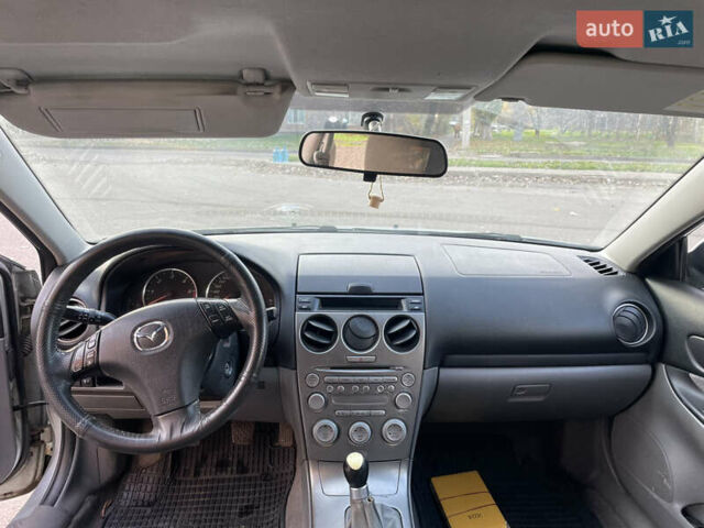 Серый Мазда 6, объемом двигателя 2 л и пробегом 399 тыс. км за 3100 $, фото 6 на Automoto.ua