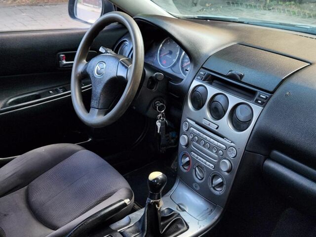 Сірий Мазда 6, об'ємом двигуна 2 л та пробігом 411 тис. км за 1951 $, фото 15 на Automoto.ua