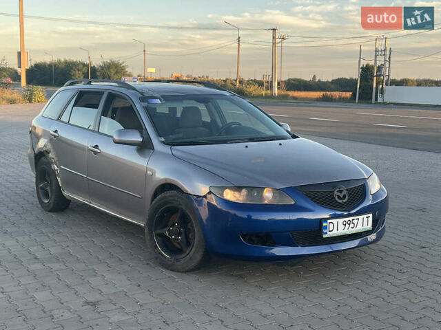 Сірий Мазда 6, об'ємом двигуна 2 л та пробігом 293 тис. км за 1600 $, фото 1 на Automoto.ua