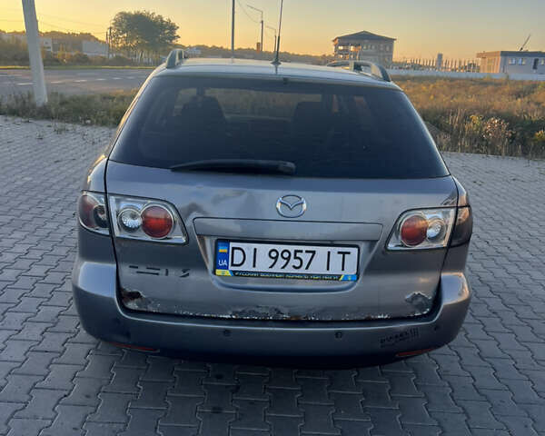 Сірий Мазда 6, об'ємом двигуна 2 л та пробігом 293 тис. км за 1600 $, фото 7 на Automoto.ua