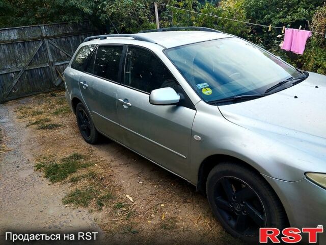 Серый Мазда 6, объемом двигателя 2 л и пробегом 380 тыс. км за 3450 $, фото 1 на Automoto.ua