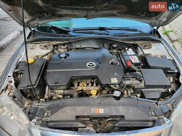 Сірий Мазда 6, об'ємом двигуна 2 л та пробігом 411 тис. км за 1950 $, фото 7 на Automoto.ua