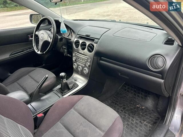 Серый Мазда 6, объемом двигателя 2 л и пробегом 312 тыс. км за 2700 $, фото 5 на Automoto.ua