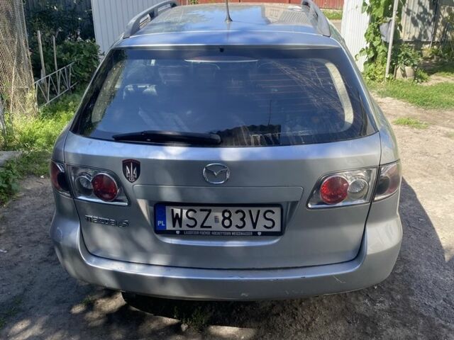 Сірий Мазда 6, об'ємом двигуна 2.3 л та пробігом 312 тис. км за 1231 $, фото 3 на Automoto.ua